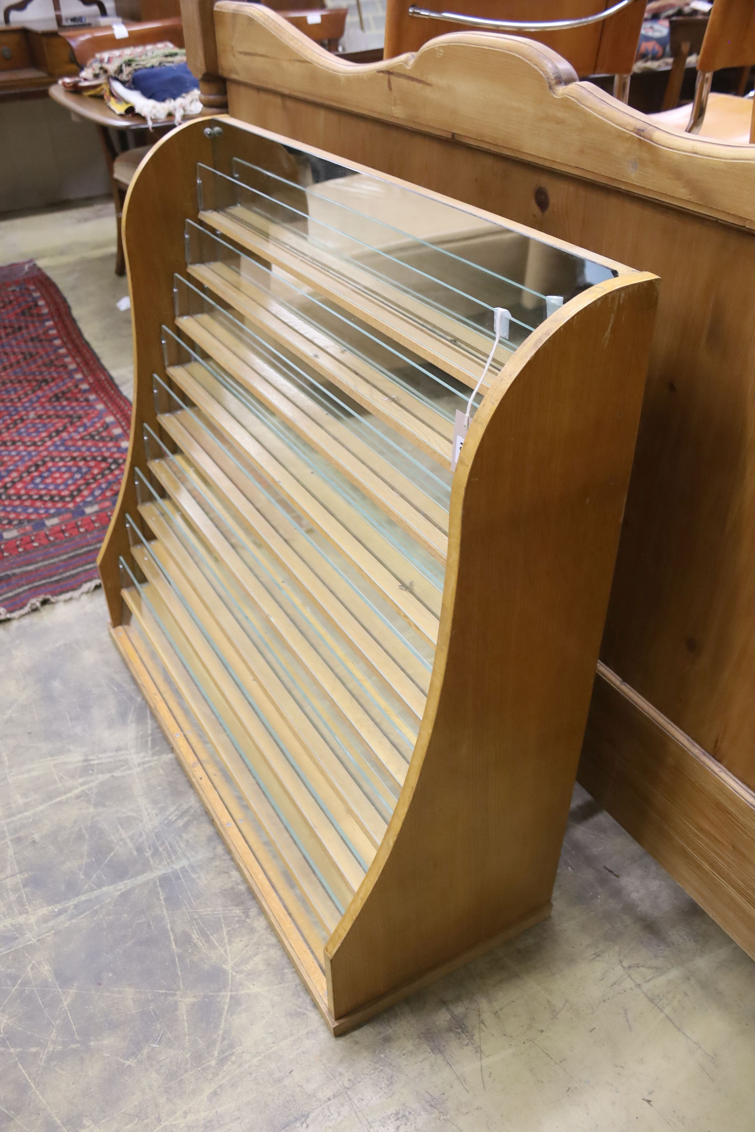 A mid century mirrored oak countertop shop shelving unit, length 94cm, depth 36cm, height 92cm